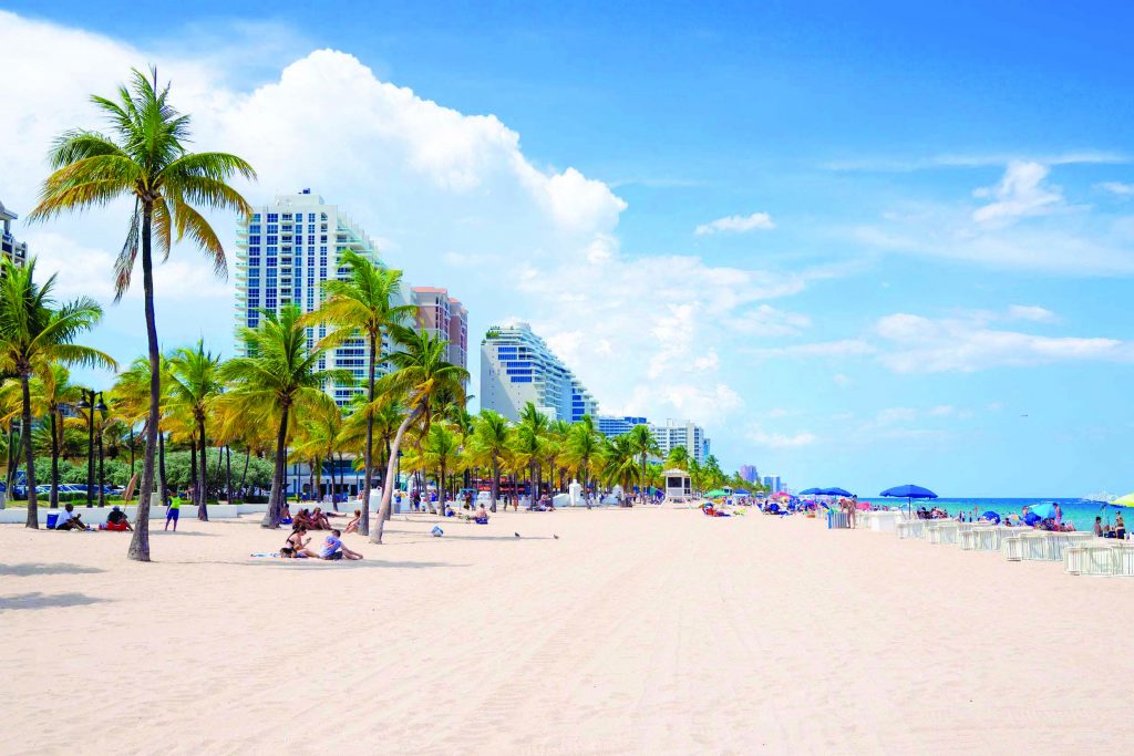 49643922 - people enjoying the beach at fort lauderdale in florida on a summer day