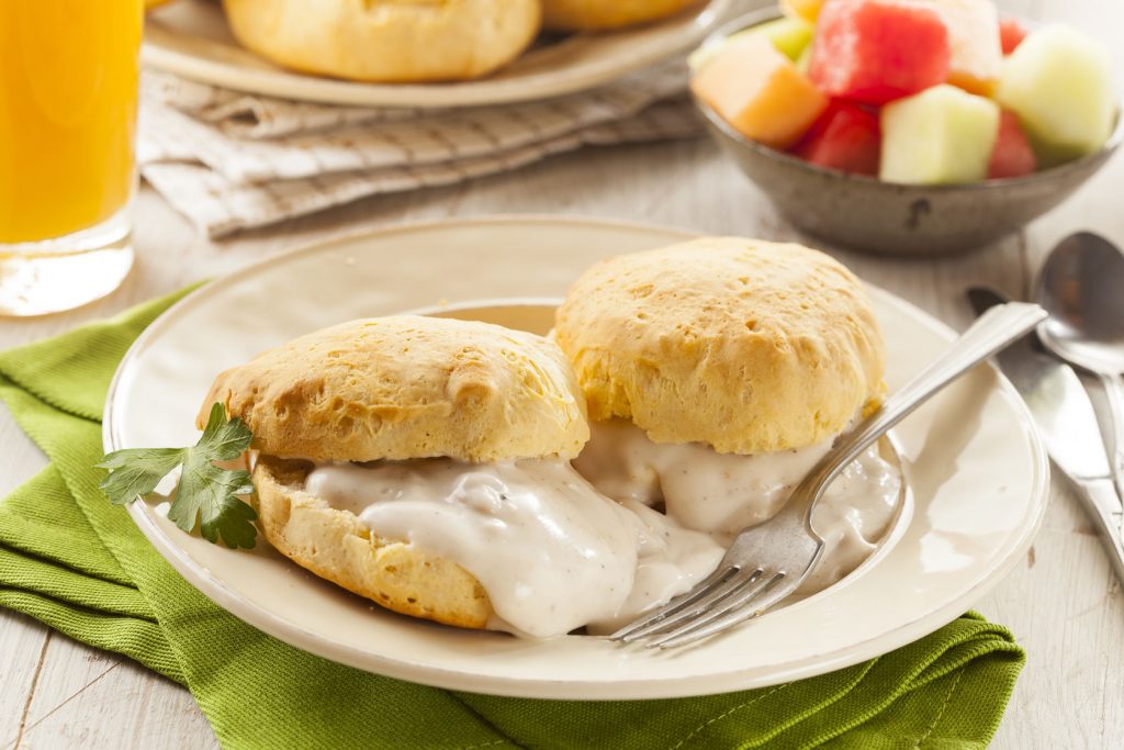 25522910 - homemade buttermilk biscuits and gravy for breakfast